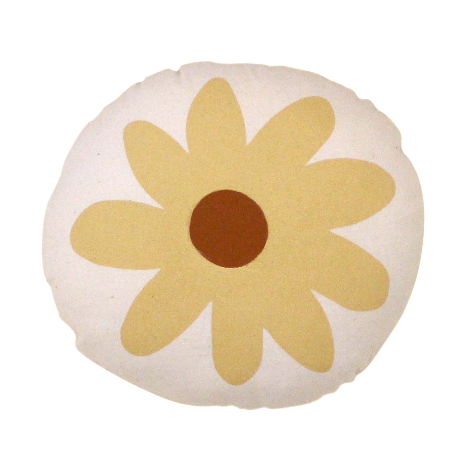 the daisy pillow is a white pillow and a yellow daisy in the middle 