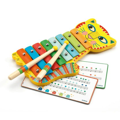 Colorful children's xylophone with a lion design on a white background
