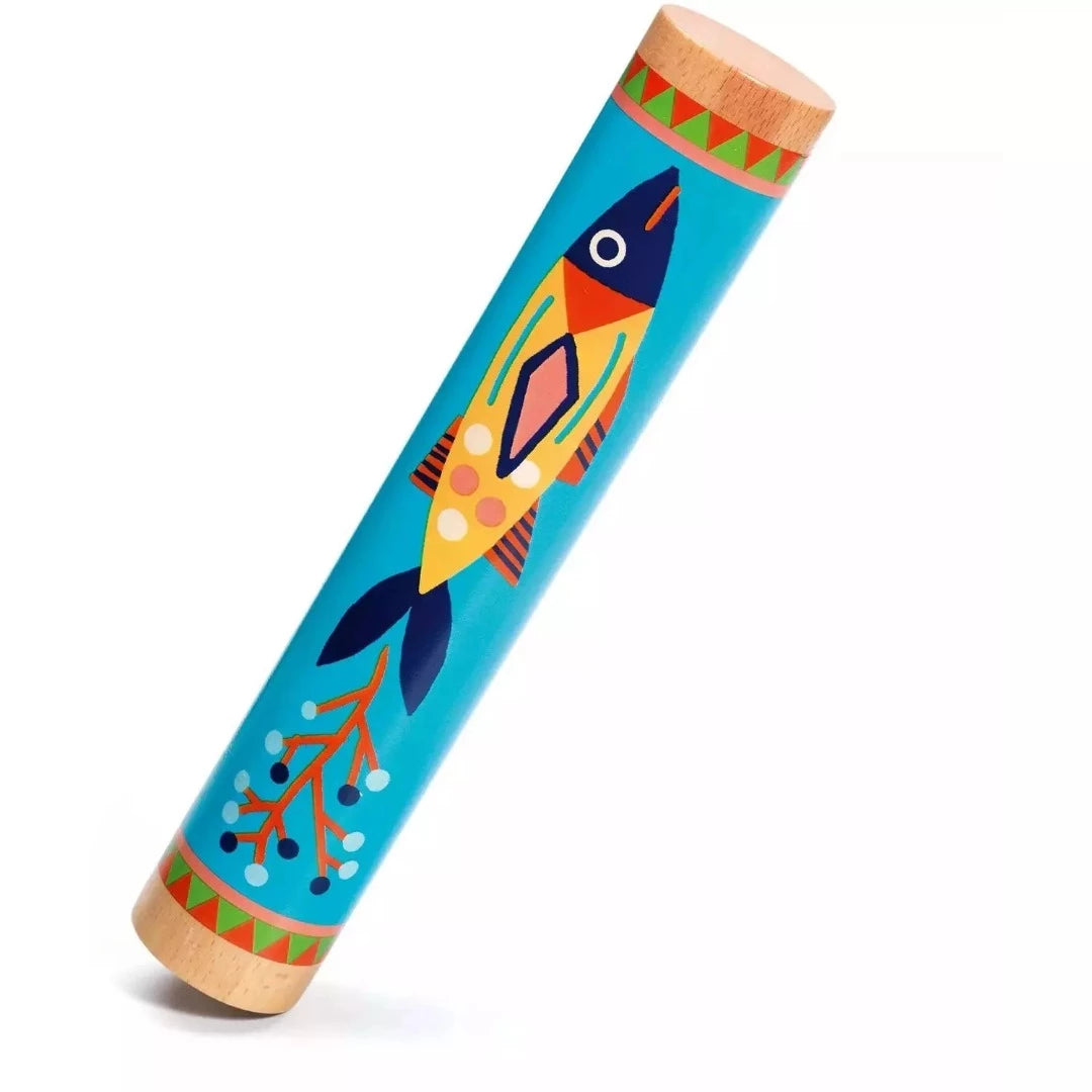 A wooden musical rainstick with a colorful fish pattern on it.