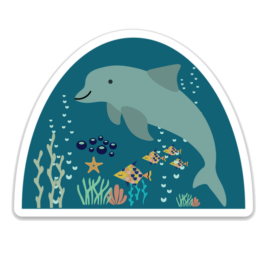 the dolphin sticker is blue sticker with a big dolphin on it. you can also see seaweed, bubbles, fish, coral, and starfish mixed on to the sticker. 