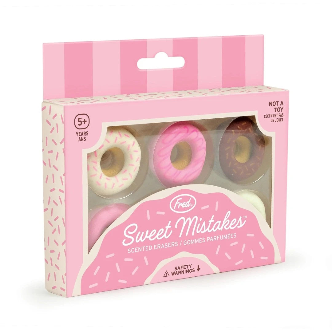 Multi-colored donut shaped erasers in a pink box