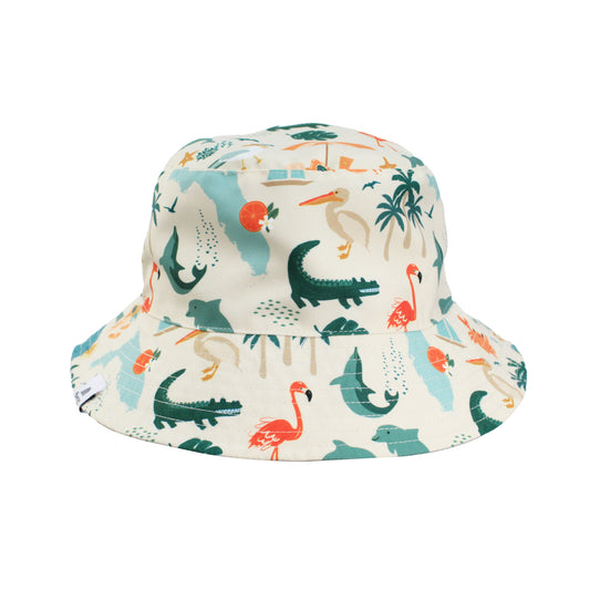 Kids reversible bucket hat featuring the Explore Florida print with alligators, flamingos, and pelicans on a cream background.