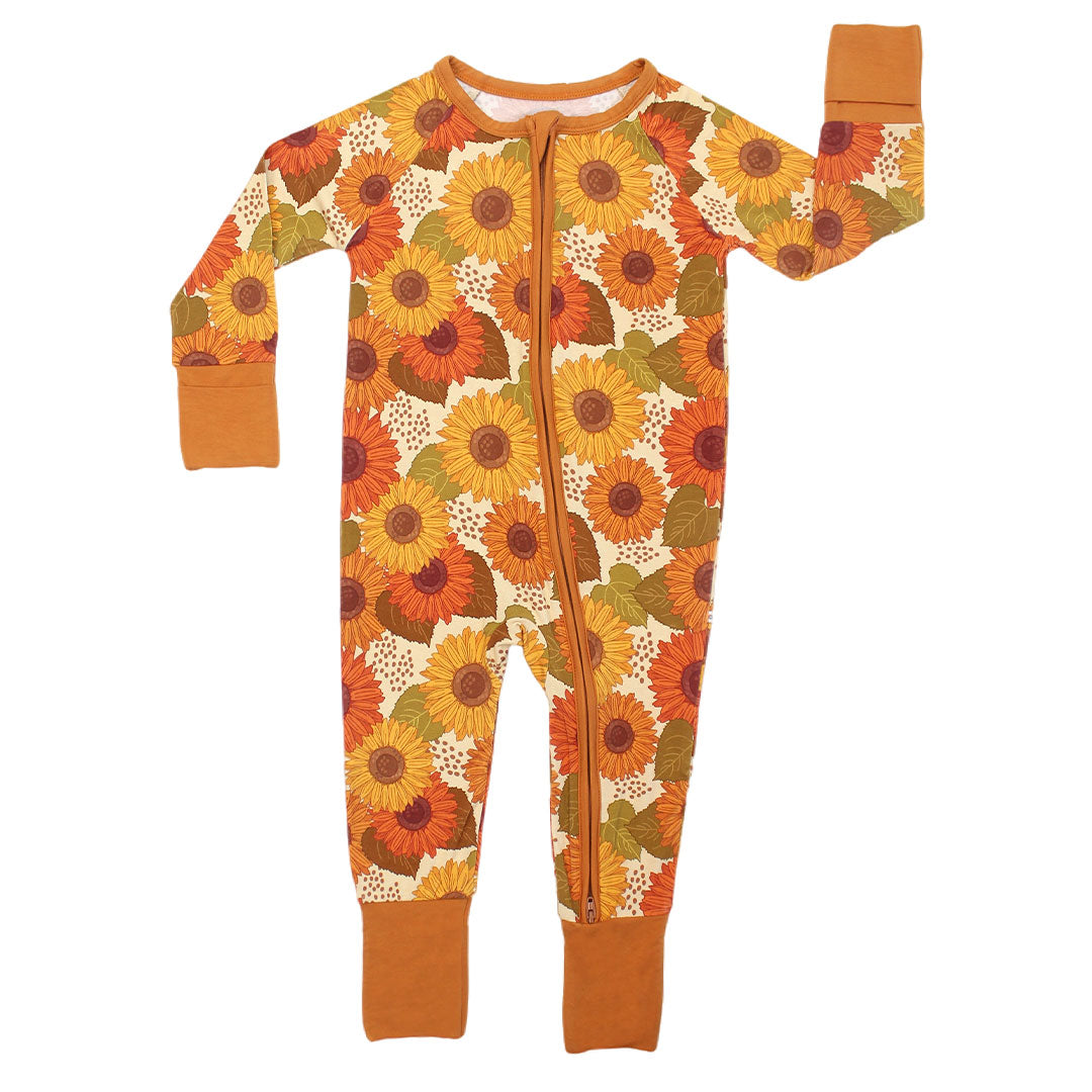 the "sunflower' baby convertible. the "sunflowers" print is a sunflower floral design. it has a variety of yellow, orange, and red sunflowers, mixed into green leaves. 