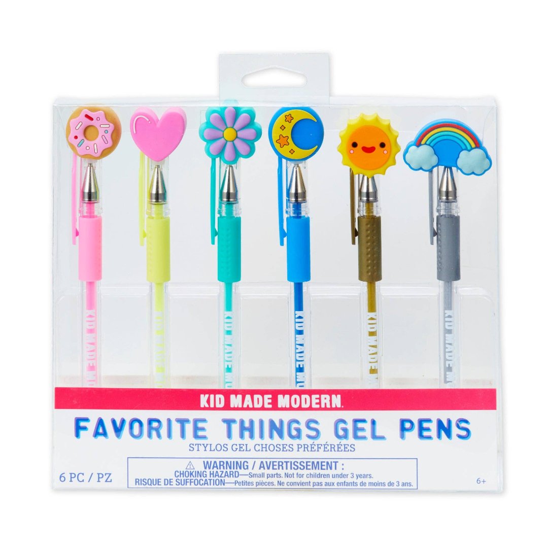 rainbow pens with fun shapes on the caps including a donut, heart, flower, moon, sun, and rainbow