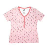 Our Fancy Flamingos women's top is a pattern of multiple pink flamingoes scattered around the print. 