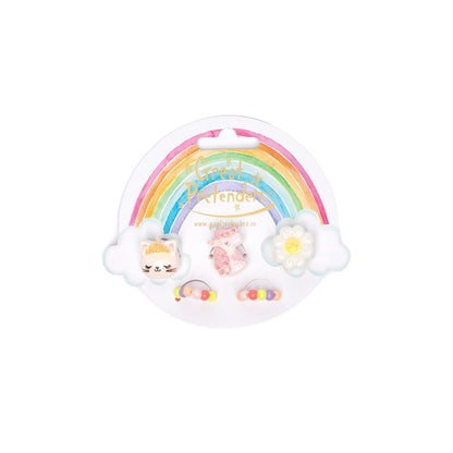 5 piece ring set of a display card that is shaped like a cloud with a rainbow over top. The rings include a kitty wearing a crown, a pink unicorn head, a daisy flower and 2 beaded rainbows