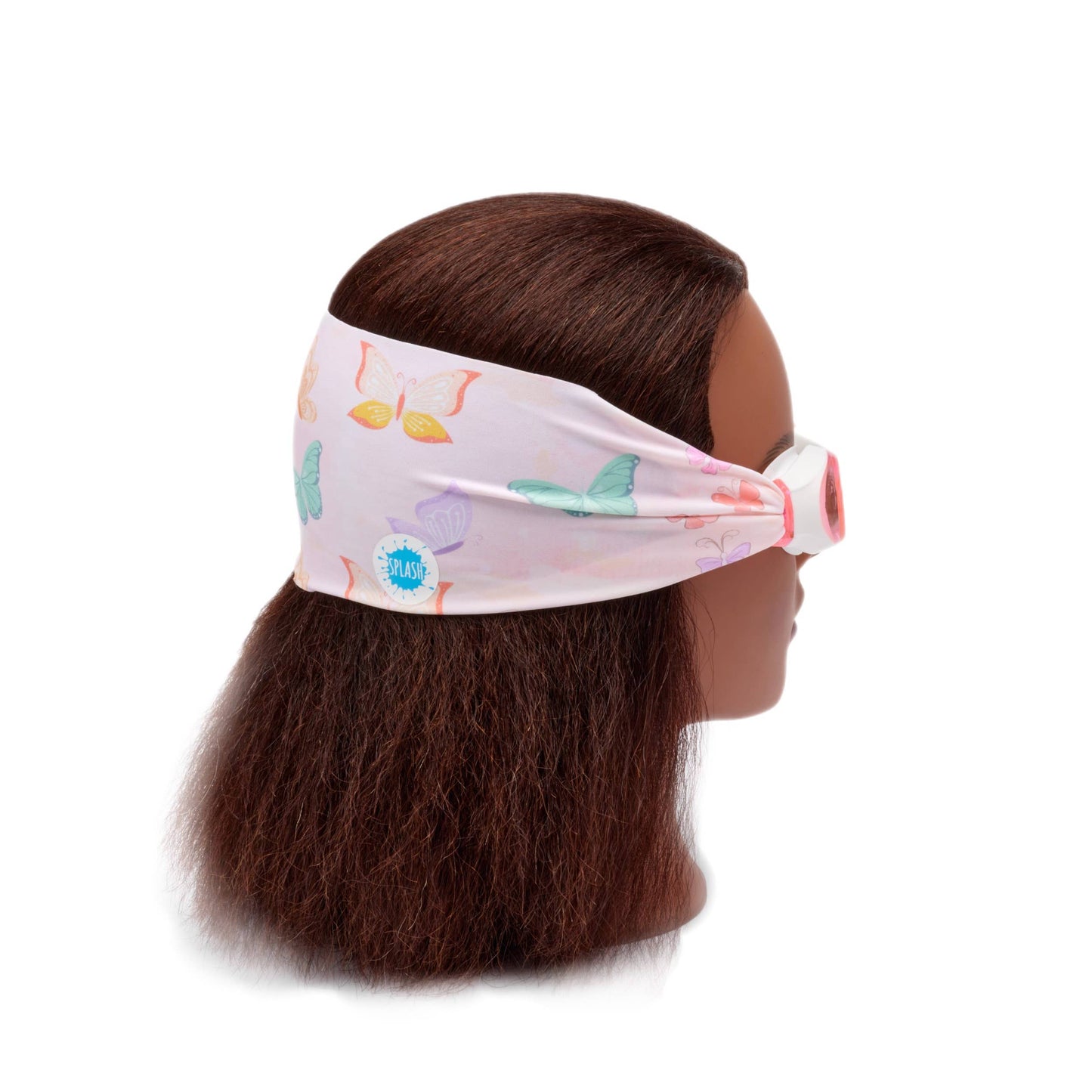 Mannequin head with colorful headband featuring cartoon butterflies on a white background• Splash Place flutter swim goggles with butterfly print fabric strap
• No tangle fabric strap swim goggles with pink tinted lenses and white frame