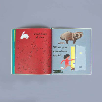 Open book with illustrations and text on a gray background