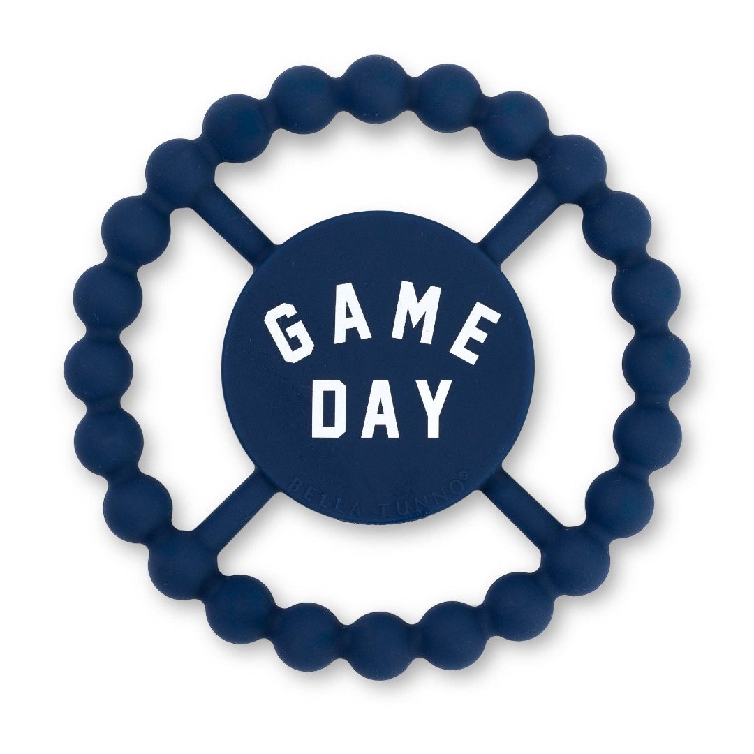 blue teething ring that says game day on it