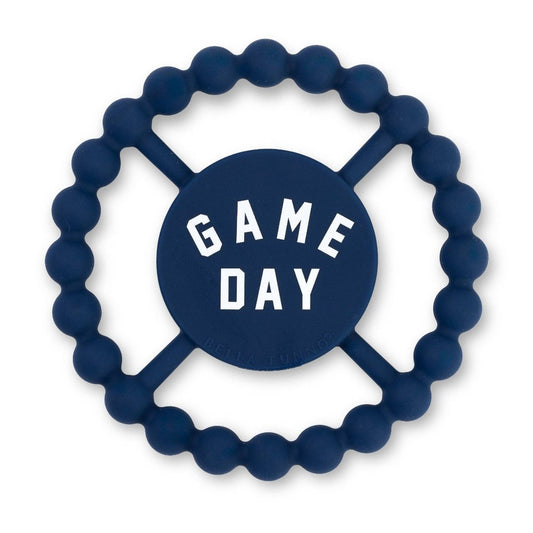 blue teething ring that says game day on it