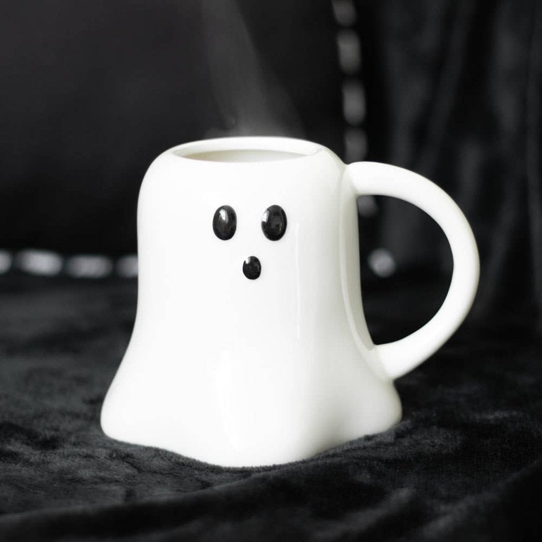 white ceramic mug shaped like a ghost 