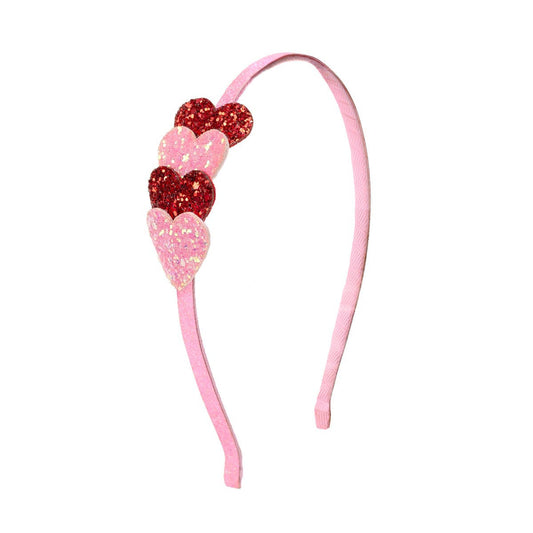 pink headband with glittery hearts on it in red and pink