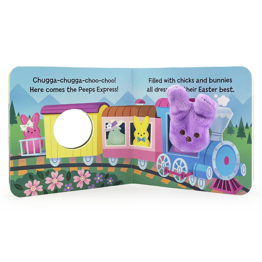 inside of the peeps finger puppet book, a purple peeps is driving a train with other peeps aboard