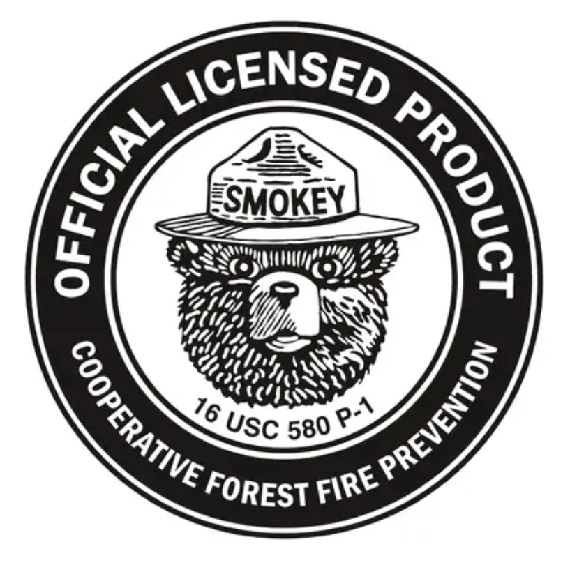 Black and white logo of Smokey the Bear with text 'Official Licensed Product' and 'Cooperative Forest Fire Prevention'.