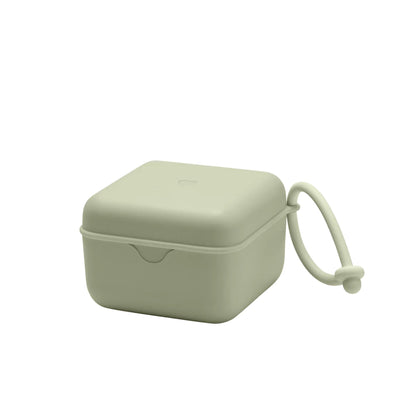 Light green square container with a lid and handle on a white background