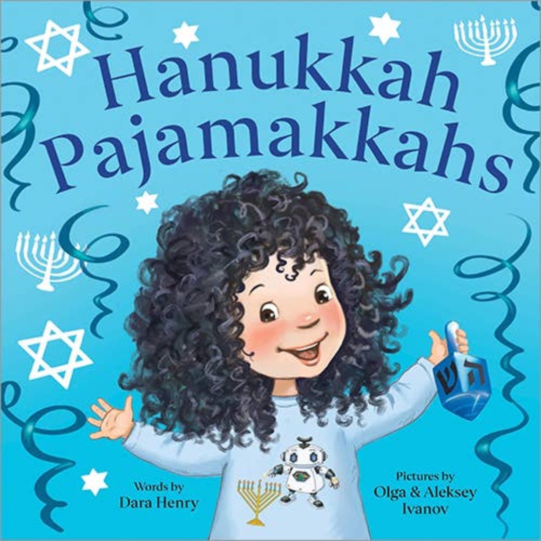 blue book cover with a little girl holding a dreidel