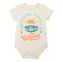 Beige baby bodysuit with 'Happiness Comes in Waves' design on a white background