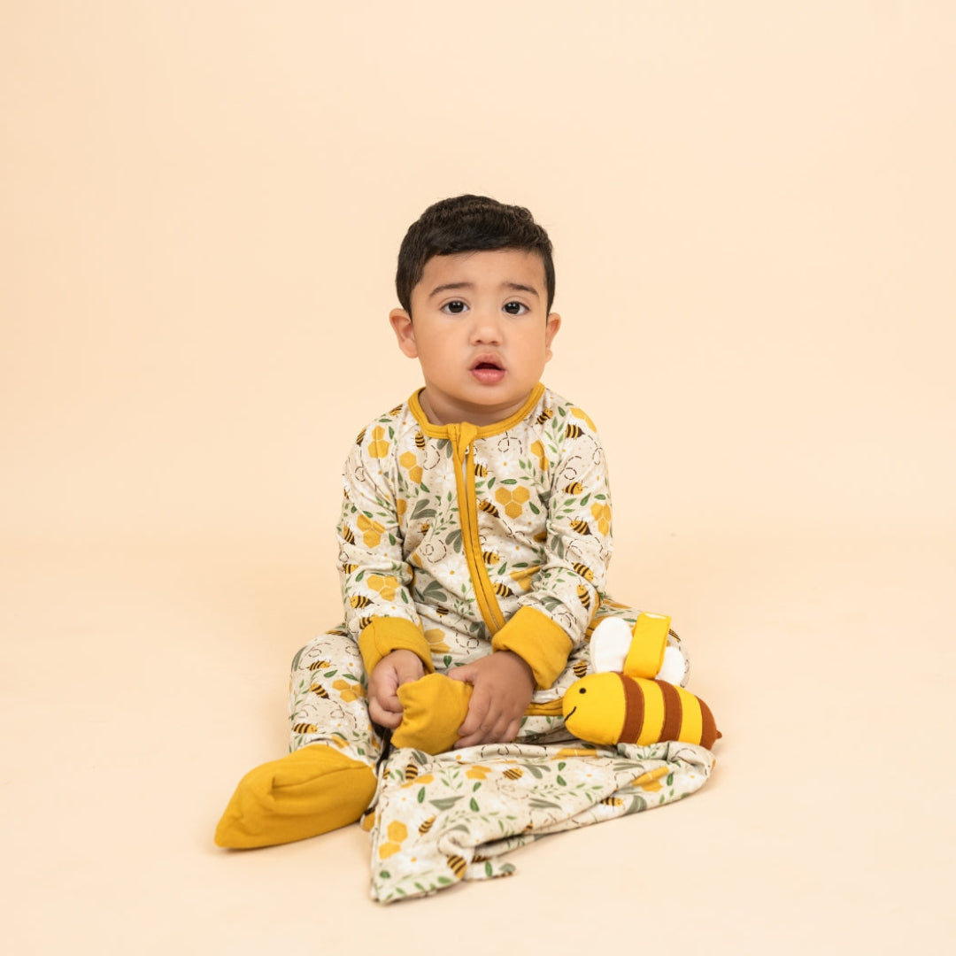 Adorable Happy Honey Bees baby lovey blanket made from ultra-soft and breathable bamboo fabric, featuring a charming bee and honeycomb print, perfect for cuddles and comfort.