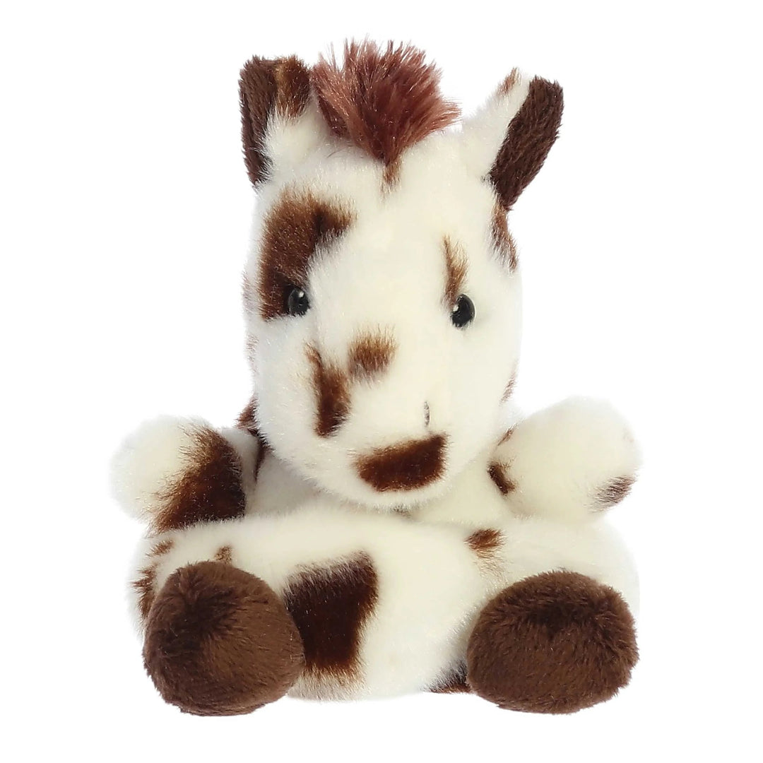 brown and white stuffed horse