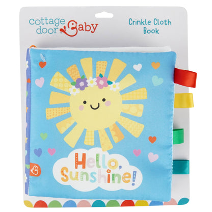 Cottage Door Baby crinkle cloth book with a sun design on a white background