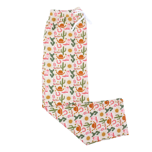 Emerson and Friends Hey Y'all relaxed pajama pants adorned with a charming cactus and flower print, ideal for cozy evenings at home.