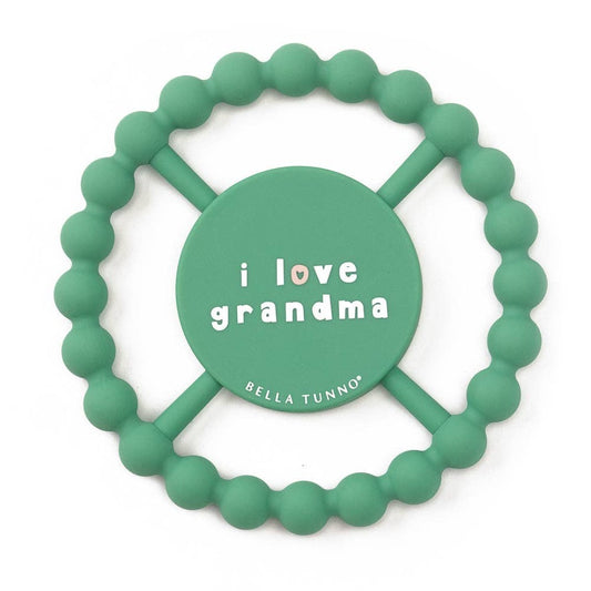 green baby teether ring that says i love grandma on it