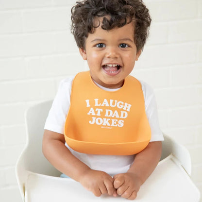 kid wearing the yellow bib