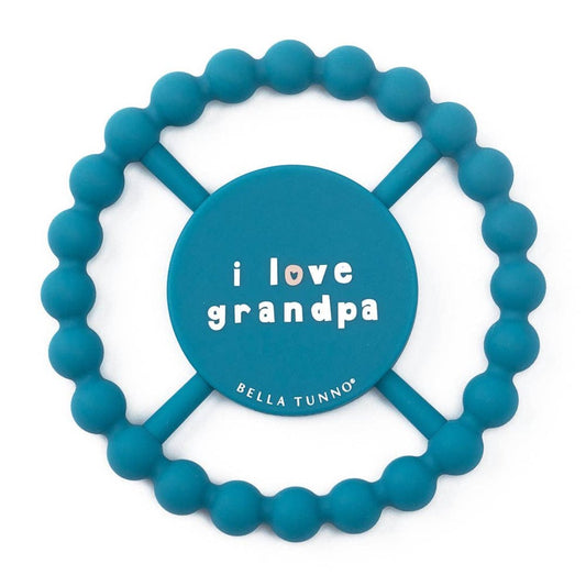 a blue baby teether that says i love grandpa on it