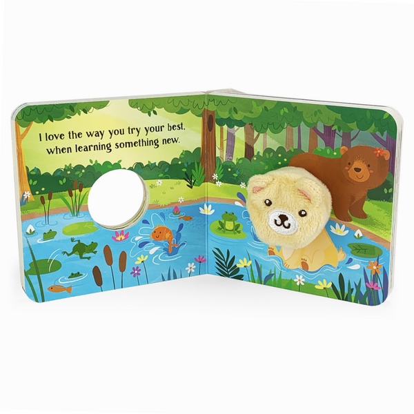Yellow bear puppet in a board book multi-colored pond and forest scene
