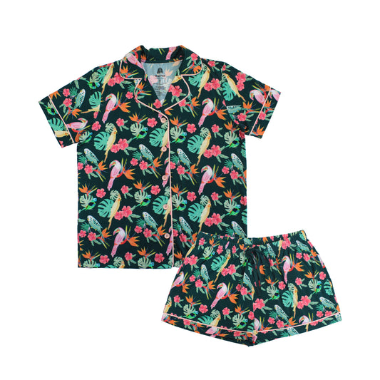Women's two-piece bamboo pajama set featuring a short sleeve button-down shirt and matching shorts in the Isla Botánica tropical birds print.