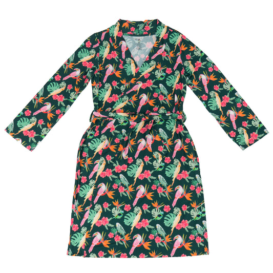 Colorful dress with tropical parrot and flower pattern on a white background