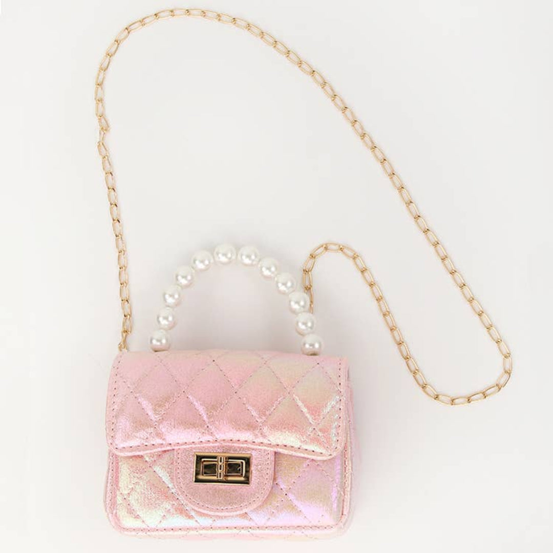 Light pink purse with gold accents for little girls