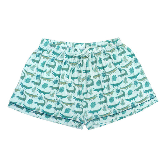 the "later gator" women's bamboo pajama shorts. the "later gator" print has a mix of light and dark green alligators, leaves, and white dots scattered on a teal colored background. 