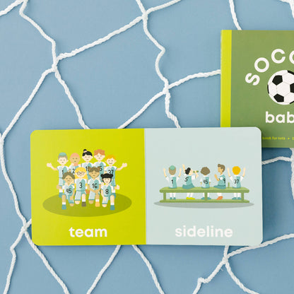 Two children's books on a blue textured background with soccer theme