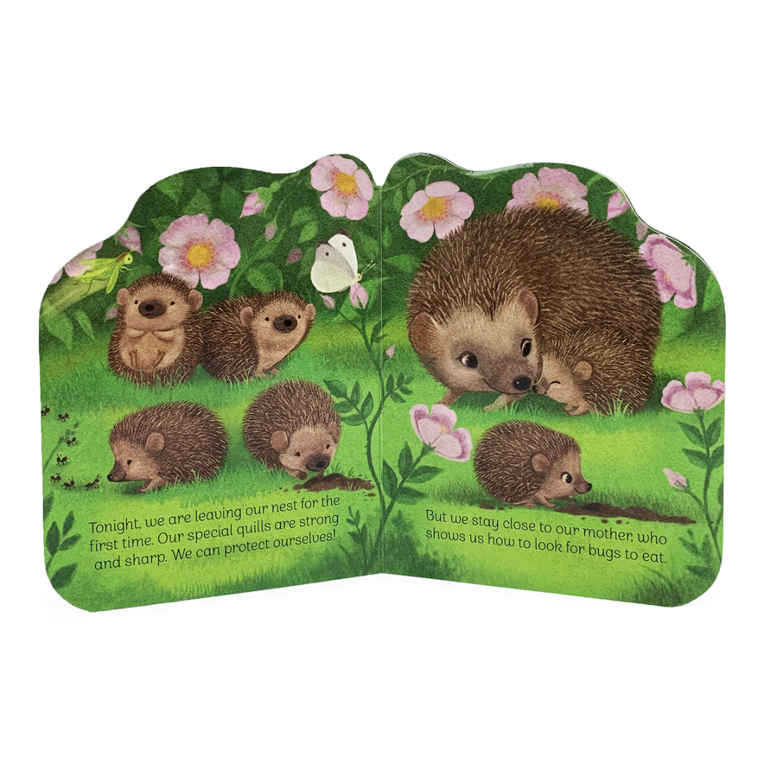 Board book with multiple brown hedgehogs on green grass and pink flowers