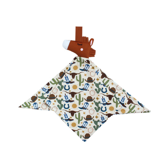 Our lovey featuring a charming cowboy-themed print with blue boots, cacti, suns, horseshoes, and cowboy hats. The perfect blend to pair with our bamboo pajamas. 