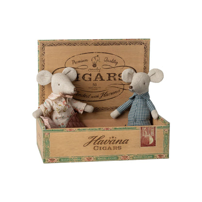 Two plush toy mice in a decorative Havaina Cigars box on a white background