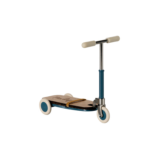 Children's scooter with a blue handlebar and white wheels on a white background