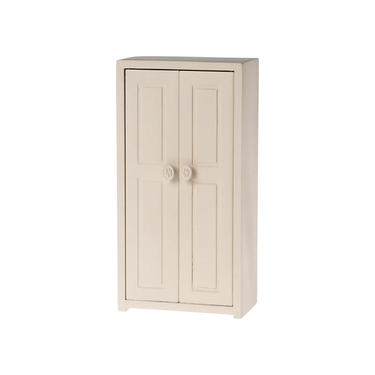 Beige two-door cabinet on a white background