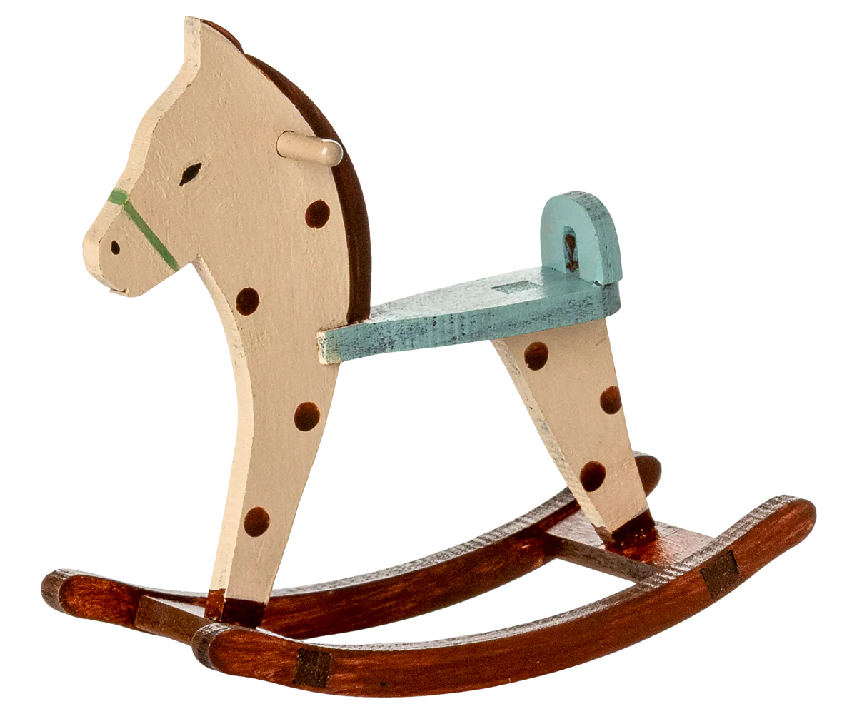Wooden rocking horse with a white background