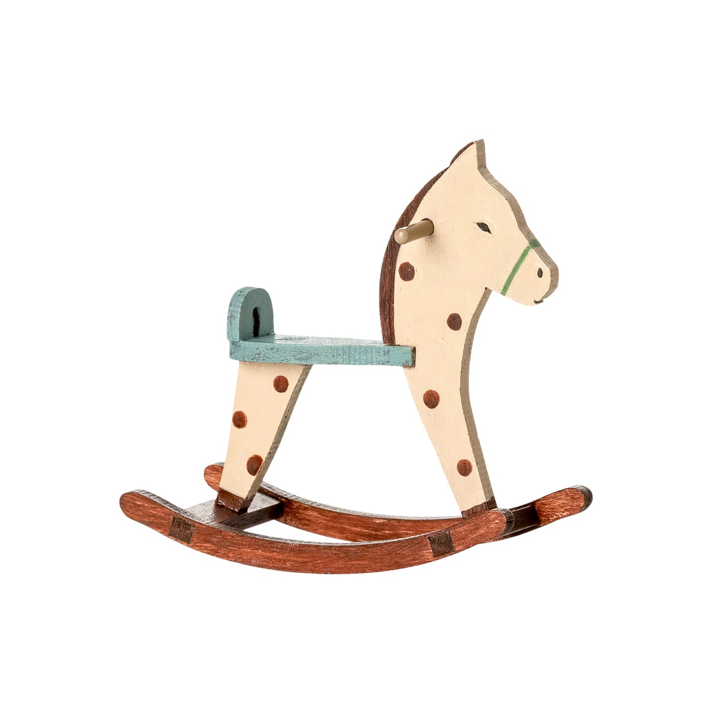 Wooden rocking horse with polka dot pattern on a white background