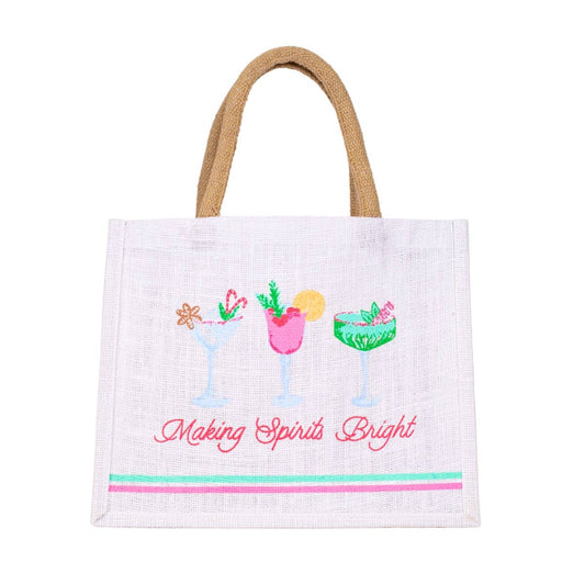 white tote bag with 3 cocktails on the front and the words Making spirit bright