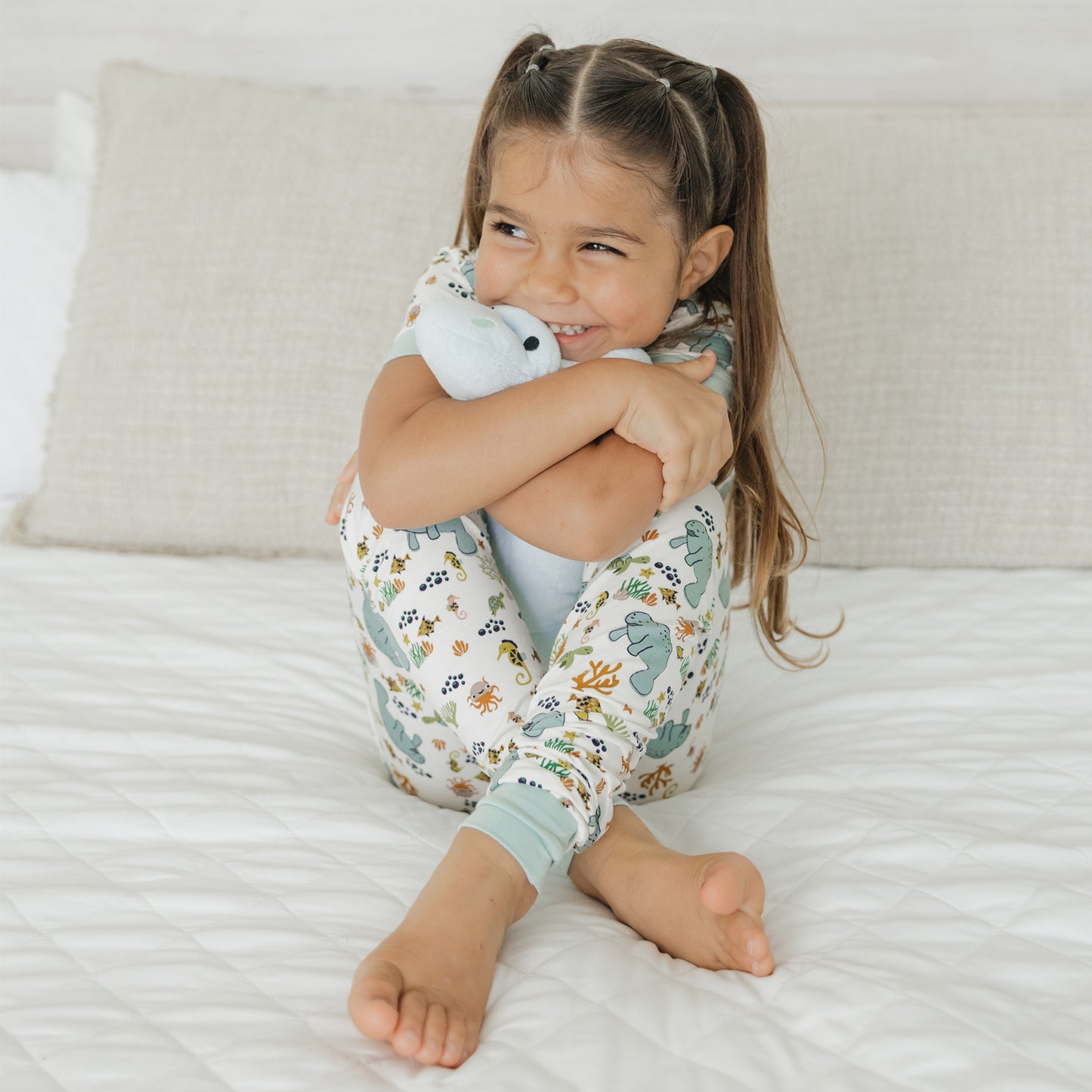 Kids wearing manatee bamboo short sleeve pajama set soft breathable sleepwear for sensitive skin