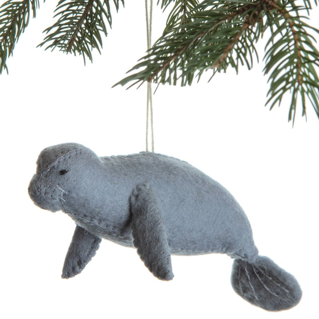 gray manatee shaped ornament made of felt