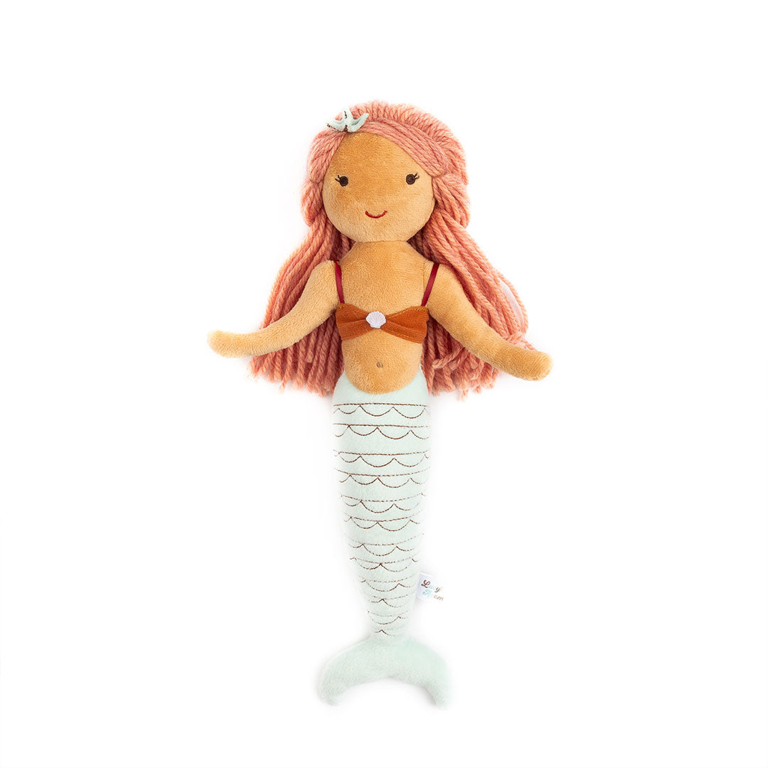 Cordelia the stuffed plush mermaid. Cordelia is a red-head mermaid with an orange top and blue tail. 