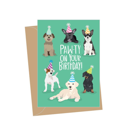 Green birthday card with multi-colored dogs in party hats