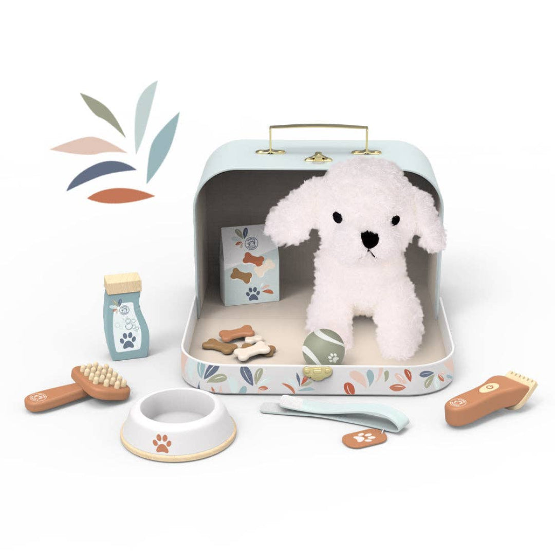 little suitcase set with a stuffed puppy, wooden dog bowl, treats, brush, color, ball, pretend shampoo and pretend clippers
