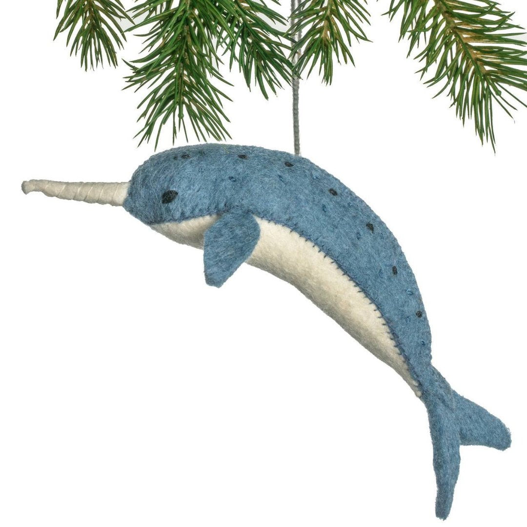 blue narwhal shaped ornament made out of felt