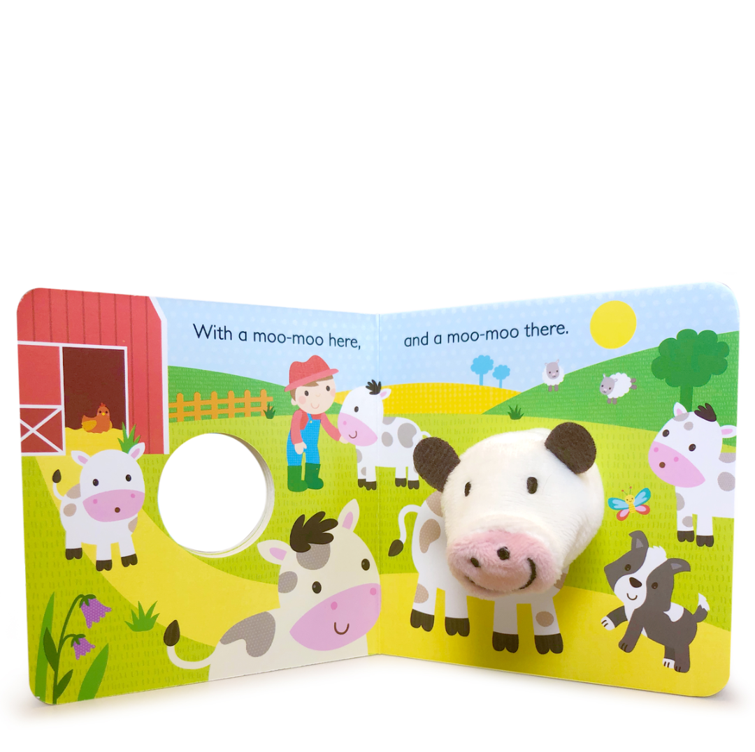 inside pages of a farm themed board book with lots of little cows and a farmer inside