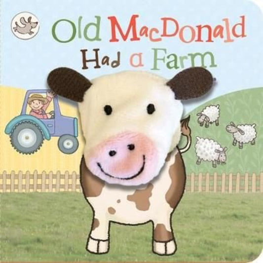 White and brown cow finger puppet on a multi-colored board book with a farm scene